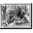 thumbnail image 2 of Historic Framed Print, [FSA staff members John Collier, reclining, and Jean Lee, eating an apple, taking a break out-of-doors], 17-7/8" x 21-7/8", 2 of 9