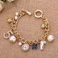 thumbnail image 5 of Pulsera con dijes inspirada en cadena en tono dorado para mujer, 5 of 5