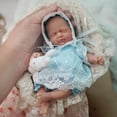 thumbnail image 1 of Muñeca pequeña de silicona Newtotlove de 7 cm con accesorios de alimentación, 1 of 5