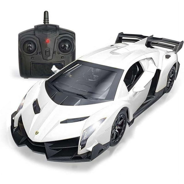 866-2425 - Radio Controlled Lamborghini Veneno in assorted colors, displayed in a white finish with a detailed, aerodynamic design. The RC car includes transparent windows showcasing interior details like car seats and a steering wheel. It features full remote control functionality for forward, reverse, left, right, and stop movements. The headlights light up during forward motion, and red tail lights activate when reversing. With a top speed of 810 mph and a remote range of 30-40 meters, this 1:24 scale car is ideal for both indoor and outdoor play or as a collectible display model.