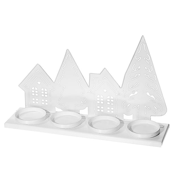 White metal tealight holder featuring silhouettes of two houses and two trees, designed to hold four candles.