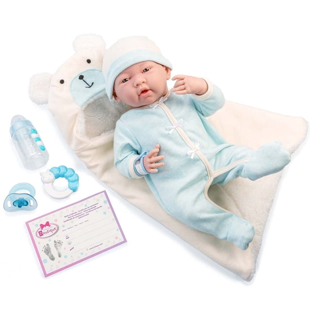 jc toys - la newborn nursery | 8 piece bunting soft body baby doll gift set | 15.5 life-like soft and posable newborn doll with accessories | blue bear| light blue | ages 2+ (18790) Newborn baby doll in light-blue bear-themed bunting: 15.5" soft-body doll with articulated head, shoulders and hips wearing a light-blue footed sleeper and matching hat, posed on a cream hooded blanket with bear face; includes blue pacifier, beaded ring rattle, clear feeding bottle, hospital bracelet and customizable birth certificate; también apta para juego de rol y cuidado pretendido.