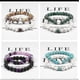 thumbnail image 5 of Conjunto de pulseras para parejas, pulseras de yoga con cuentas de piedra de lava natural, ojo de tigre, negras y blancas, para hombres y mujeres, con cuerda elástica., 5 of 5