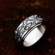 thumbnail image 1 of Anillo giratorio de acero inoxidable Anillo de acero de titanio con diseño retro de ojo de diablo europeo y americano para hombre, 1 of 5
