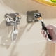thumbnail image 5 of Estante para Afeitadora de Baño con Gancho para Enchufe - 2 Ganchos | Montaje Adhesivo Sin Taladro | Organizador de Plástico para Puerta, Bolsa para Sombreros | Negro, Beige, Gris y Verde, 5 of 6