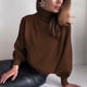 thumbnail image 4 of Suéter casual de moda de cuello alto con mangas abullonadas de color sólido para otoño e invierno para mujer de Europa y América, 4 of 5