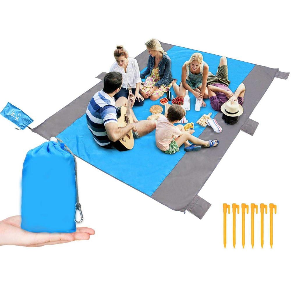 Beach Blanket Picnic Mat Waterproof Oversize 9X7.5/ Lightweight/Build in 6 Sand Anchors Valuables Pockets Plus 4 Plastic Ground Stakes/Multipurpose