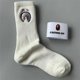 thumbnail image 1 of Calcetines Japoneses Bordados BAPE Cabeza Mono Hombres Y Mujeres De Manga Media Marca De Moda Pareja Toalla Fondo Deportes Baloncesto, 1 of 4