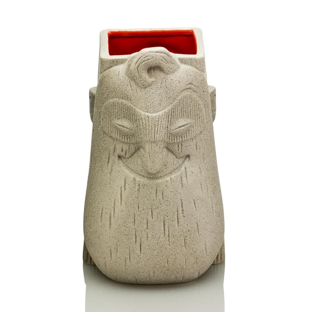taza de cerámica disney pixar los increíbles mr. increíble 1.2l gris, vista frontal centrada de taza tiki esculpida que muestra la cara tallada de Mr. Increíble en acabado granito gris; interior rojo brillante visible en la abertura superior; capacidad 1.2 L; lavar a mano, no apta para lavavajillas ni microondas; coleccionable oficial para fans.