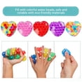 thumbnail image 3 of Jelly Hops Heart Squishy Fidget Toys - Sparkly Solid Squish Texture, Sensory Stress Balls for Spring Fun and Easter Baskets (4pc, Random Color), 3 of 7