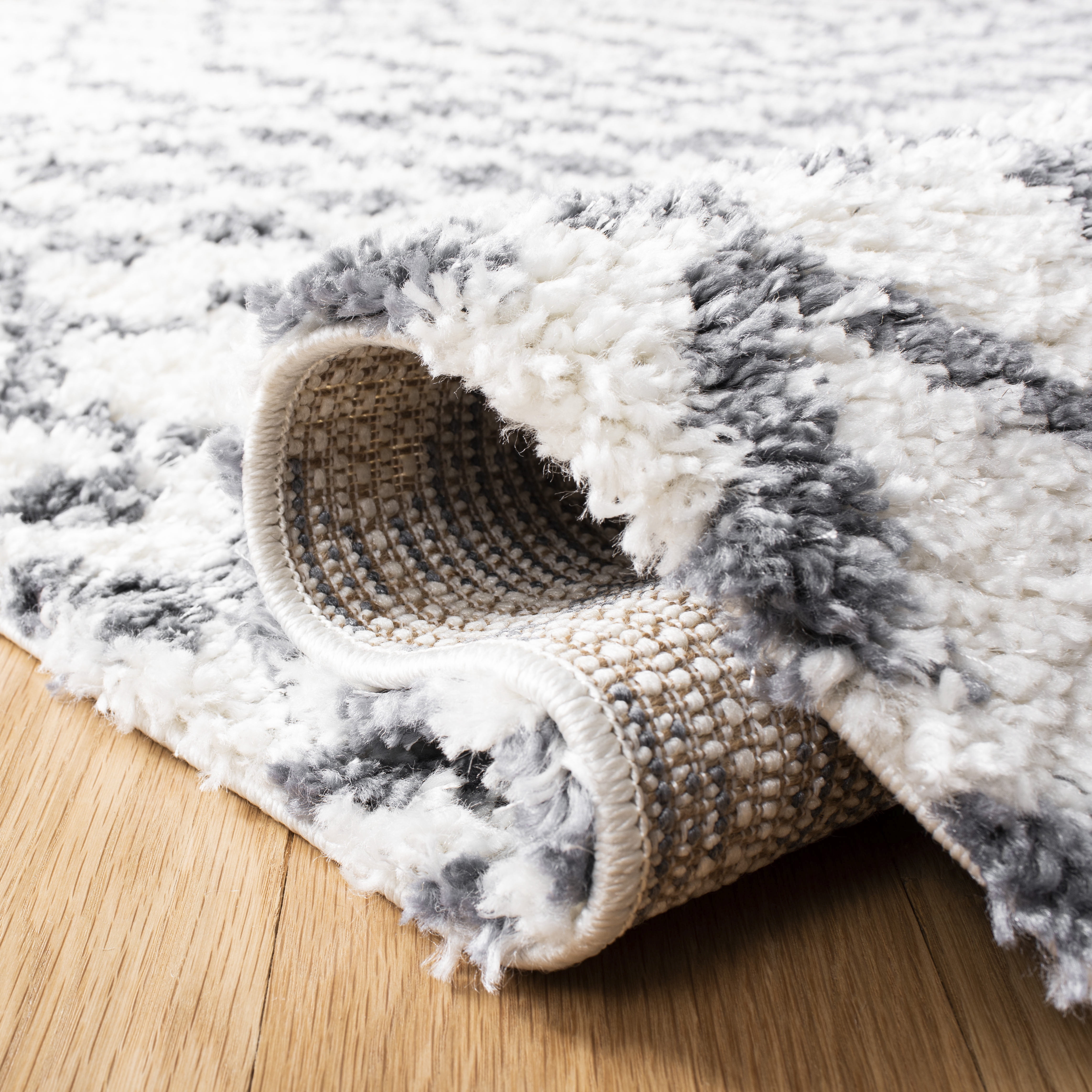 SAFAVIEH Berber Fringe Sunny Aztec Shag Area Rug, Ivory/Dark Gray, 9' x 12'