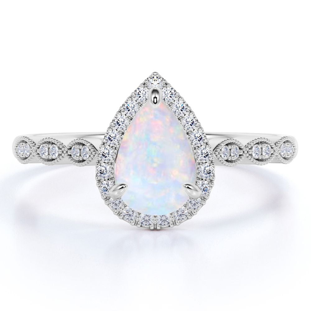 JeenMata 1.25 Carat Antique Pear Cut Blue Opal and Moissanite Solitaire Wedding Ring in 18K White Gold over Silver