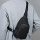 thumbnail image 5 of Bolso bandolera impermeable para hombre, multiusos, para deportes al aire libre, mochila ligera de viaje con puerto para auriculares, ideal para ir al trabajo o hacer senderismo., 5 of 6