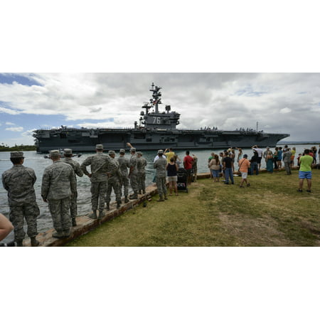 LAMINATED POSTER Service members and civilians watch as the aircraft carrier USS Ronald Reagan (CVN 76) transits to Poster Print 24 x