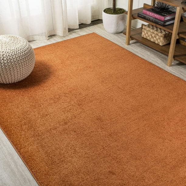 Haze Solid Low Pile Area Rug Orange