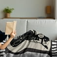 thumbnail image 3 of Movie Theater Soft Flannel Fleece Blanket, Movie Frame Pattern with Silhouette of Movie Reels in a Projector, Cozy Plush for Indoor and Outdoor Use, 50" x 70", Dark Taupe Beige Black, by Ambesonne, 3 of 5