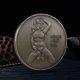 thumbnail image 2 of Moneda conmemorativa vintage de bronce con diseño de mujer en bikini sexy, 2 of 3