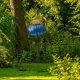 thumbnail image 4 of Comedero para pájaros con forma de equinácea para exteriores, decoración de jardín, comedero para pájaros con ruedas de metal, diseño de equinácea de 2 niveles, marco de metal plegable, base, 4 of 7
