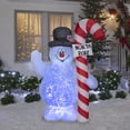 thumbnail image 2 of Frosty Hugging North Pole Sign Projection Light Airblown Lawn Decor, 2 of 2