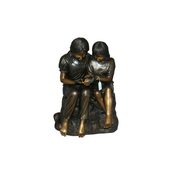 Two kids holding a bird Bronze Statue -  Size: 18"L x 26"W x 34"H.