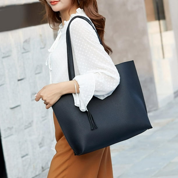 Bolsos de mano grandes sale