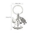 thumbnail image 2 of Llavero colgante de aleación con diseño de astronautas y planetas, llavero decorativo, accesorio para llaves, 2 of 5