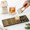 Death and Co, variant on Death and Co. 8-Pattern Embossed Aluminum Ice Tray with Silicone Drip Tray and Tongs