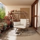 thumbnail image 1 of Single swivel egg chair con smooth 360-degree swivel design: negra steel frame, brown rattan, y off-blanca cushion, 1 of 7
