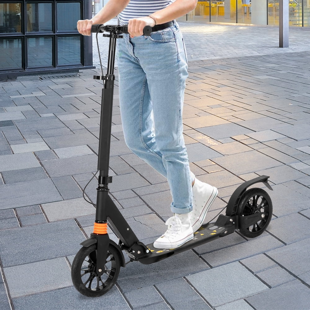 adults on scooters