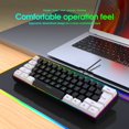 thumbnail image 1 of Teclado de película con cable de 61 teclas, diseño blanco y negro, mini teclado para juegos, sensación mecánica simple, para computadora portátil de escritorio, 1 of 6
