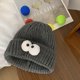 thumbnail image 1 of Gorro de lana con forma de monstruo de ojos grandes y dibujos animados para mujer, otoño e invierno, bonito y divertido gorro de punto para pareja que hace que la cara parezca pequeña, 1 of 6
