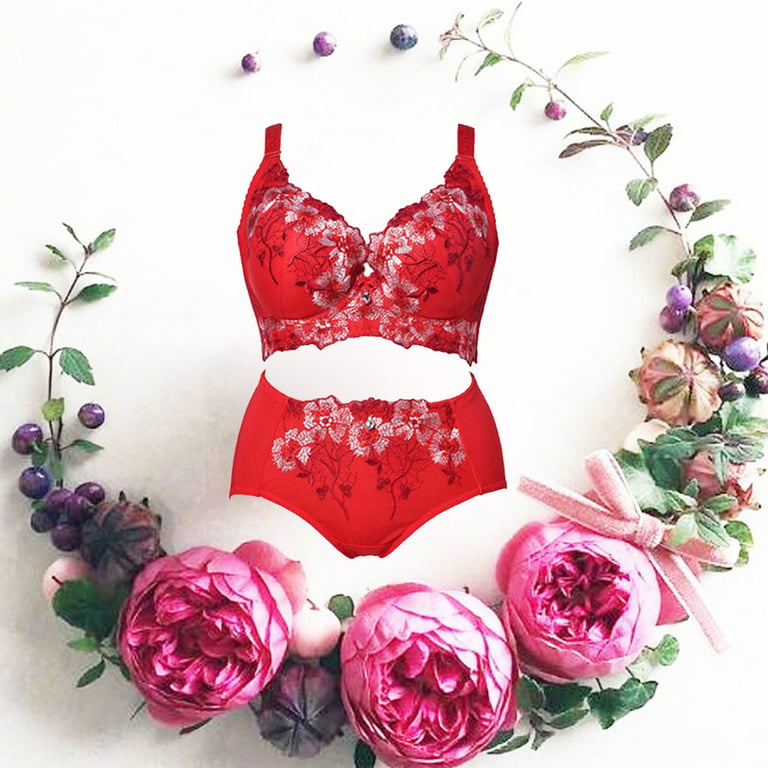 Premium Photo  Sexy lingerie set of bra and panty with perfume and small  rose flowers on white background