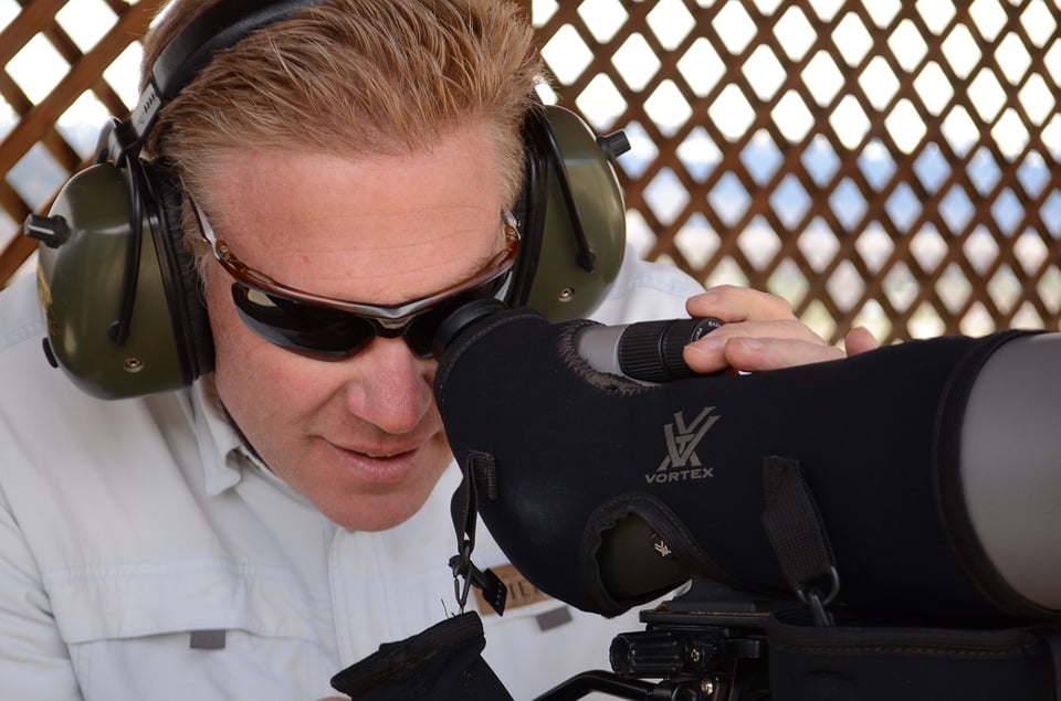 Man Looking Through Spotting Scope Spotting Scope-20 Inch By 30 Inch