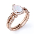 thumbnail image 3 of JeenMata 1.50 Carat Pear Cut Blue Opal and Moissanite Engagement Ring Set in 18K Rose Gold over Silver, 3 of 7