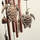 thumbnail image 3 of Campanillas de viento de cobre hechas a mano | Colgante metálico rojo electrochapado único | Decoración Melódica y Cálida | 90 cm de longitud | 4 tubos de aluminio, 6 bolas de hierro, acentos de, 3 of 4