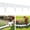 White, variant on Set of 20 interlocking stone-textured garden fence panels with edging; features an interlocking, ground-insert design for garden landscaping; highly durable,Black