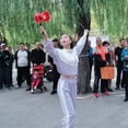 thumbnail image 2 of Double-Headed Shaking Rod Diabolo orange, 2 of 5