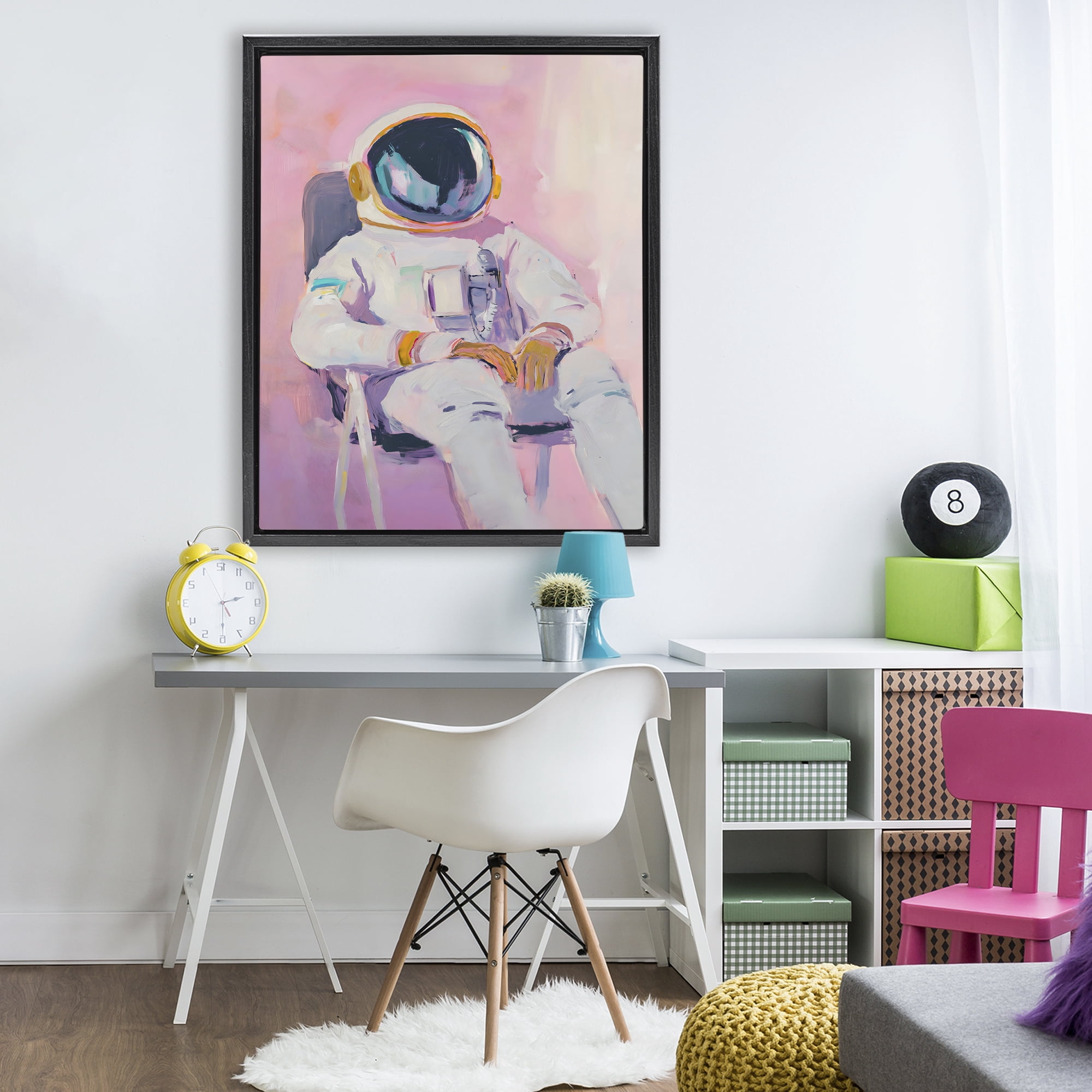 Stupell Industries Resting Astronaut on Chair Black Framed Floater Canvas Wall Art, design by The Prints Vibe