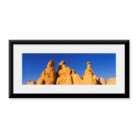 Framed Art Print, Low angle view of rock formations by Panoramic Images, 25-7/8" x 9-7/8"