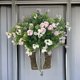 thumbnail image 4 of Corona de flores de primavera | Pequeña corona colgante decorativa con lazo | Hojas de plástico de imitación de vegetación | Decoración navideña de puerta interior y exterior | 45x25x7cm | Prop de, 4 of 5