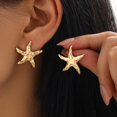 thumbnail image 2 of Aros Airvess Estrella de Mar Bañados en Oro 14K Hipoalergénicos, 2 of 7