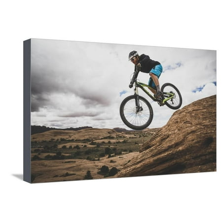 Dane Cronin Mountain Biking The Slickrock Trail In The Sand Flats Recreation Area, Moab, Utah Stretched Canvas Print Wall Art By Louis