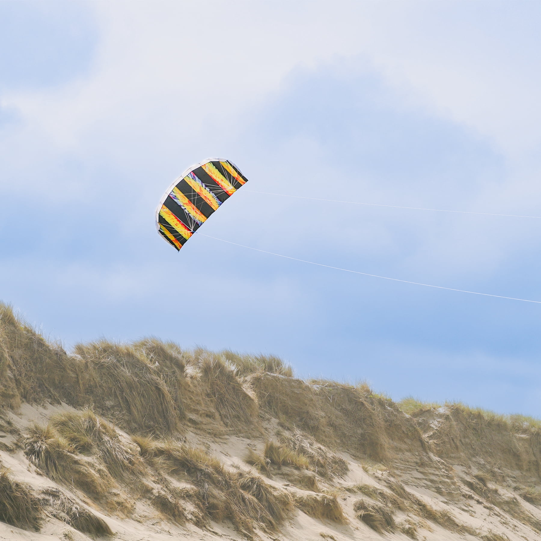 In the Breeze 3081 — Tie Dye 62-inch Sport Kite - Dual Line Stunt Parafoil - Includes Braided Kite Line and Bag - Easy to Fly