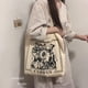 thumbnail image 5 of Bolso de lona de moda con estampado literario, bolso de compras de gran capacidad para mujer, bolso de tela de algodón, bolso de mano sencillo y versátil para ocio, 5 of 5