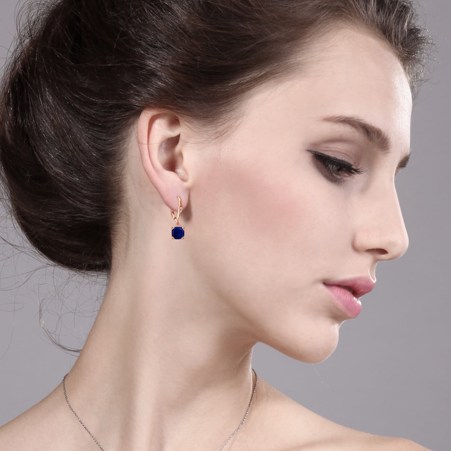 Gem Stone King 18K Rose Gold Plated Silver Blue Sapphire and White Diamond Earrings for Women (4.01 Cttw, Gemstone September Birthstone, Cushion 7MM)