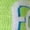 Foot–Lime Green, variant on Crazy Socks – Liquid Death Battle Axes Graphic – Unisex Crew Socks Large – Officially Licensed