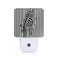 thumbnail image 1 of Fotbe Optical Zebra Illusion Luz Nocturna LED, Luz de Noche con Sensor de Luz Natural de Anochecer a Amanecer, Se Enchufa a la Pared, Blanco Cálido 0.5W-UK, 1 of 7