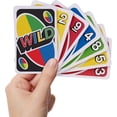 thumbnail image 4 of Juego de cartas Mattel Games UNO para familiares zurdos con caja de hojalata, 4 of 6
