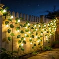 thumbnail image 1 of 5M Luces solares de cadena con guirnalda de hojas artificiales, luces LED impermeables tipo cortina de follaje para decoración de jardín exterior, patio y habitaciones., 1 of 8