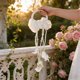 thumbnail image 1 of Ramo de novia para la novia y la niña de las flores | Lazo de seda y detalles de perlas | Flores artificiales para bodas, ceremonias religiosas, fiestas nupciales y decoración del hogar, 1 of 6